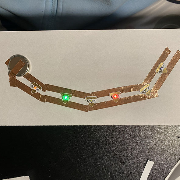 Circuit diagram with six lights (a couple didn't light up because of lack of energy)