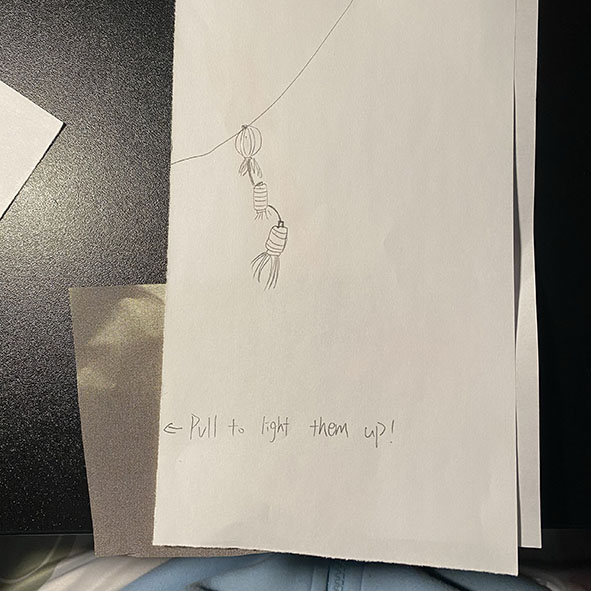 Lantern design. (Putting the cloth between the batteries will isolate the power)