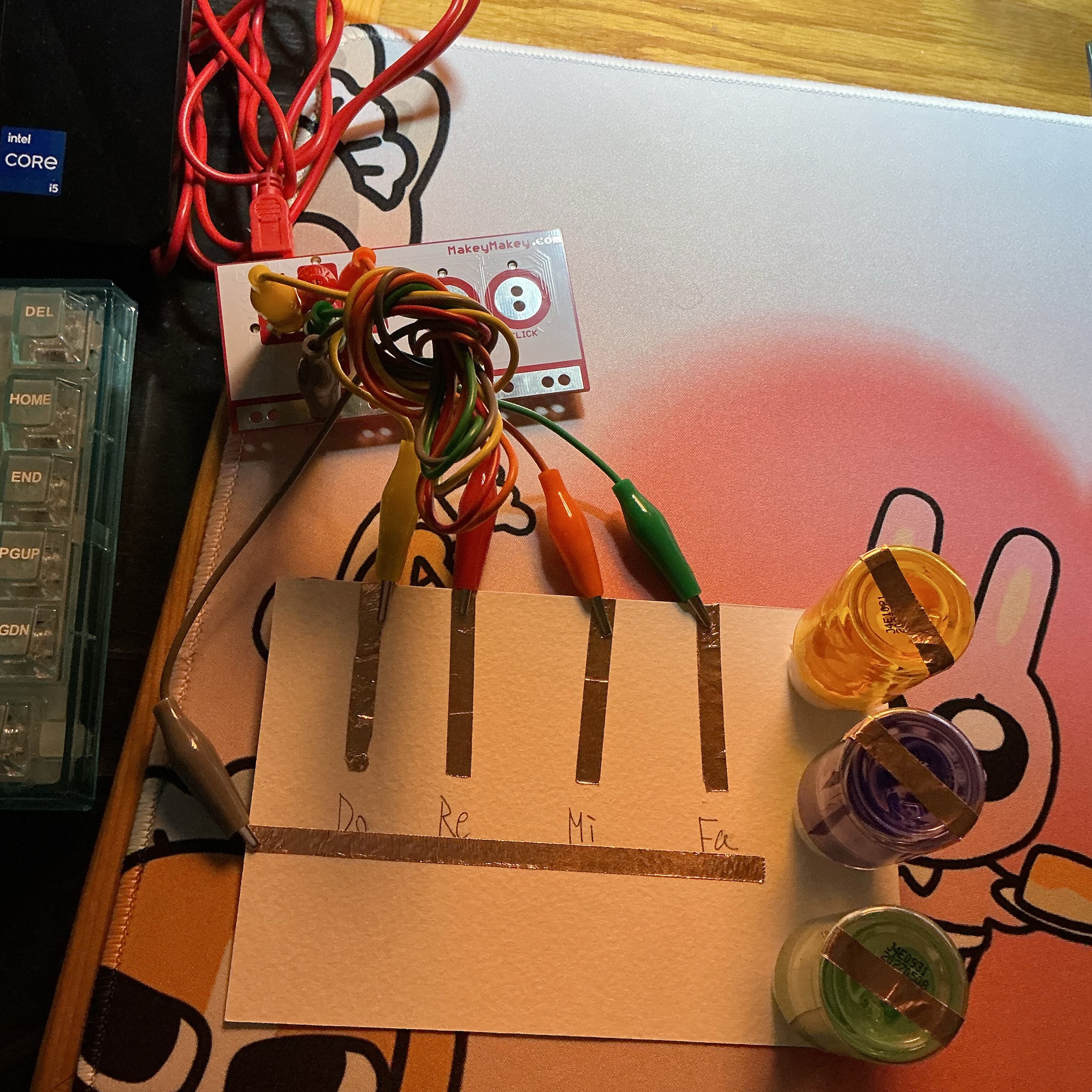 Here you can see that I added the copper tape under the plastic bottle. This way when I place them in the appropriate position they will trigger the mechanism.