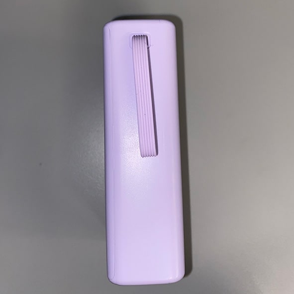 The side of the power bank with a lanyard